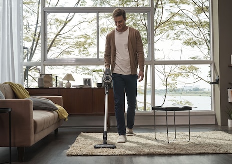 vacuuming carpet