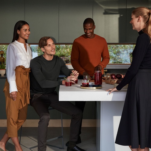 group of friends enjoying organic food and drinks